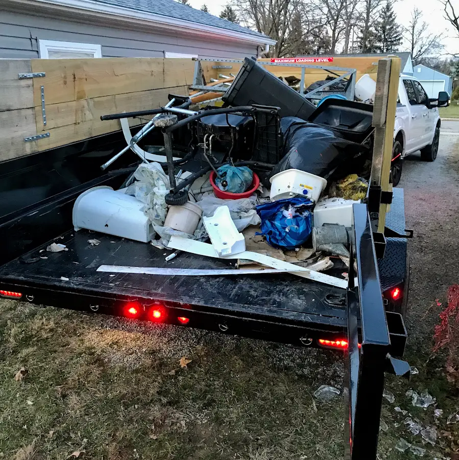 Roll-off dumpster delivered to a residential driveway in Cambridge
