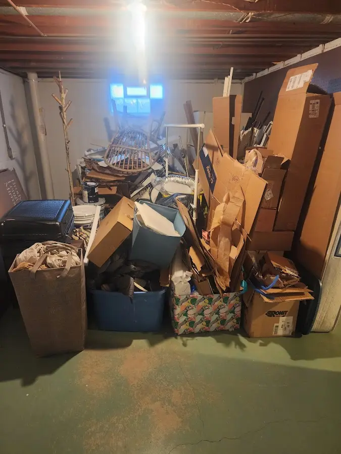 Roll-off dumpster container at job site for 15 Yard Dumpster Rental in Cambridge